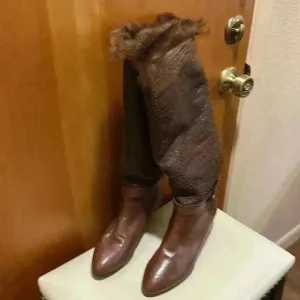 Benito Mignani. Made in Italy, heeled fur-lined boots.