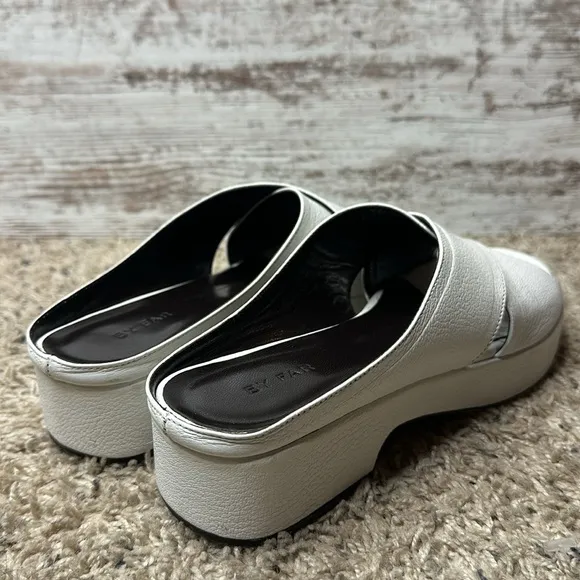 By Far Iggy Mules cross-front platform sandals in white leather