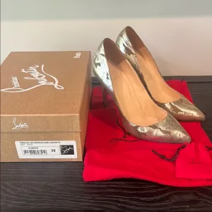 Christian Louboutin Gold Stiletto Heels