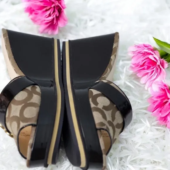 Coach woman's size 9B platform wedge with peep toe.