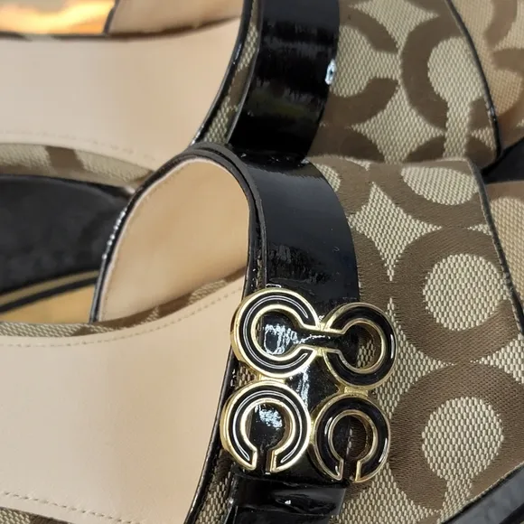 Coach woman's size 9B platform wedge with peep toe.