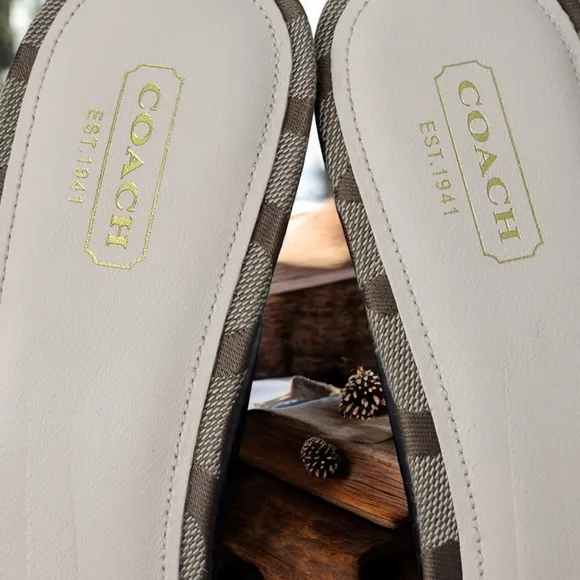 Coach woman's size 9B platform wedge with peep toe.