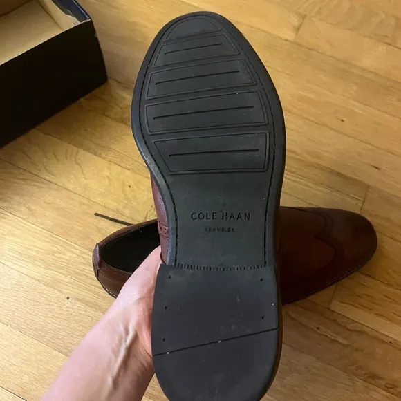 Cole Haan Men's Woodbury wingtip Dress Shoes, lined with warm material.