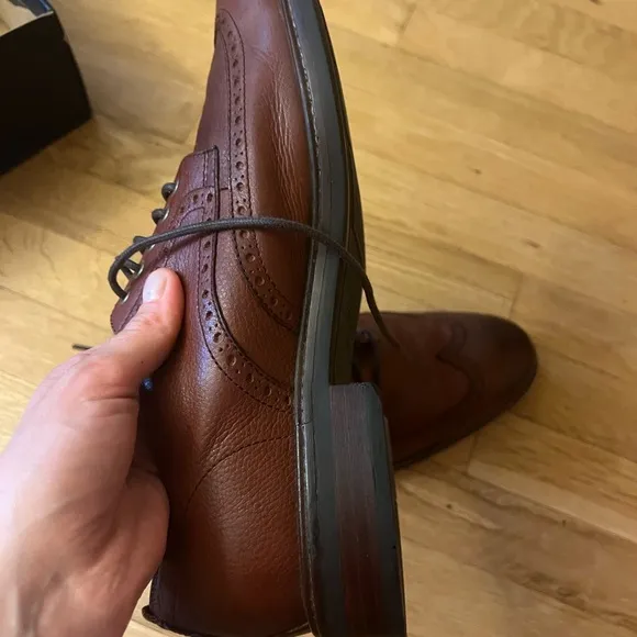 Cole Haan Men's Woodbury wingtip Dress Shoes, lined with warm material.