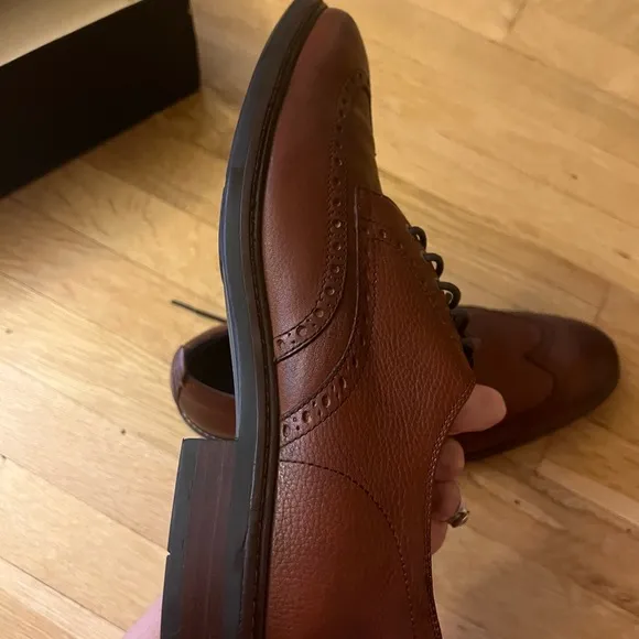 Cole Haan Men's Woodbury wingtip Dress Shoes, lined with warm material.