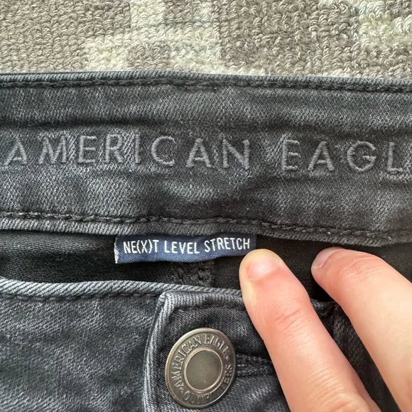 EUC 6L Long Black American Eagle Next Level Stretch Low Rise Jegging Skinny Jean