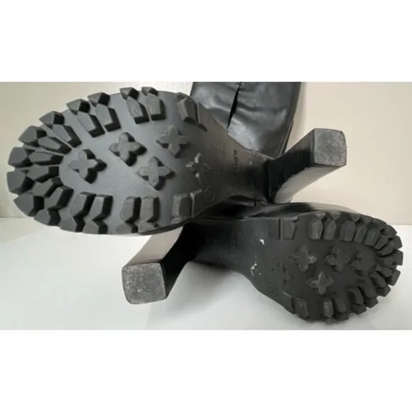 Hinge black leather boots. Size 6.5