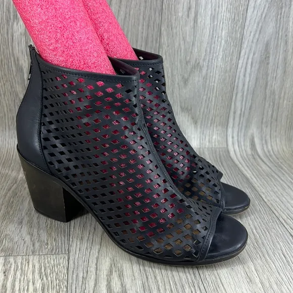 Kelsi Dagger black laser cut peep toe bootie.