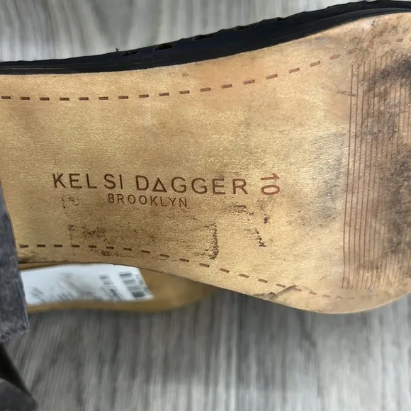 Kelsi Dagger black laser cut peep toe bootie.