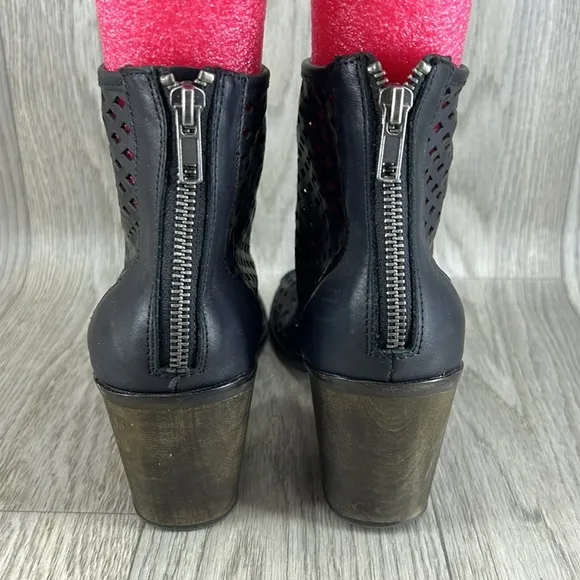 Kelsi Dagger black laser cut peep toe bootie.