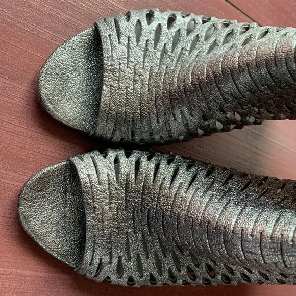Never worn Barney's New York metallic ankle boots