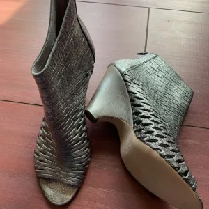 Never worn Barney's New York metallic ankle boots