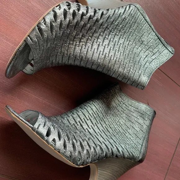Never worn Barney's New York metallic ankle boots