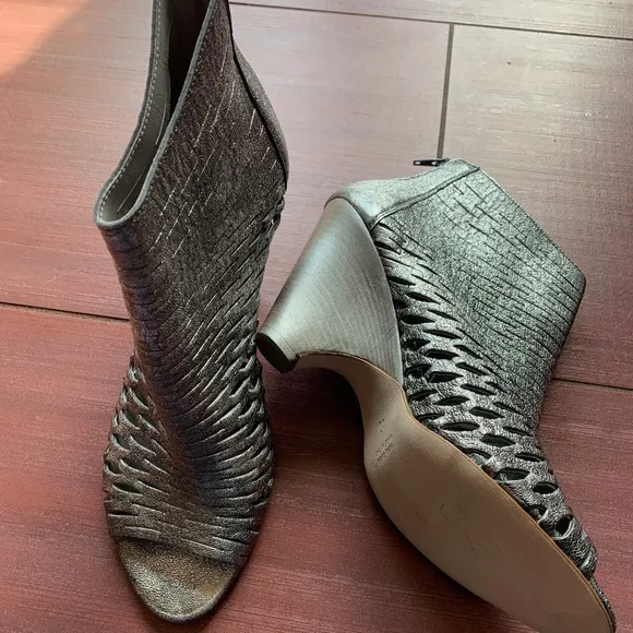 Never worn Barney's New York metallic ankle boots