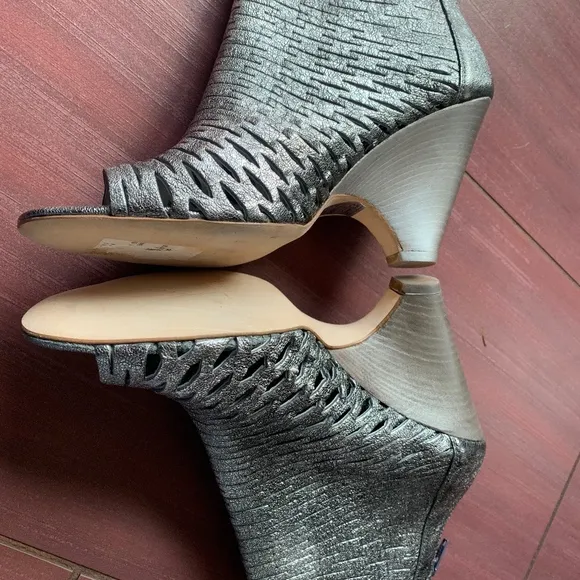 Never worn Barney's New York metallic ankle boots