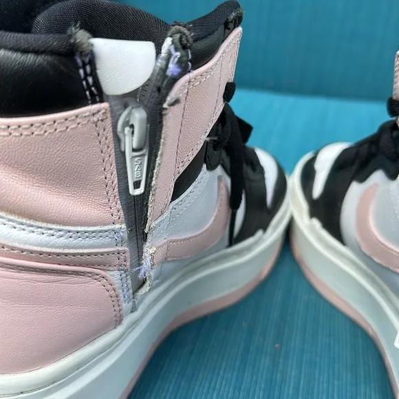 Nike Jordan Black and Pink Hightop platform sneaker with side zipper