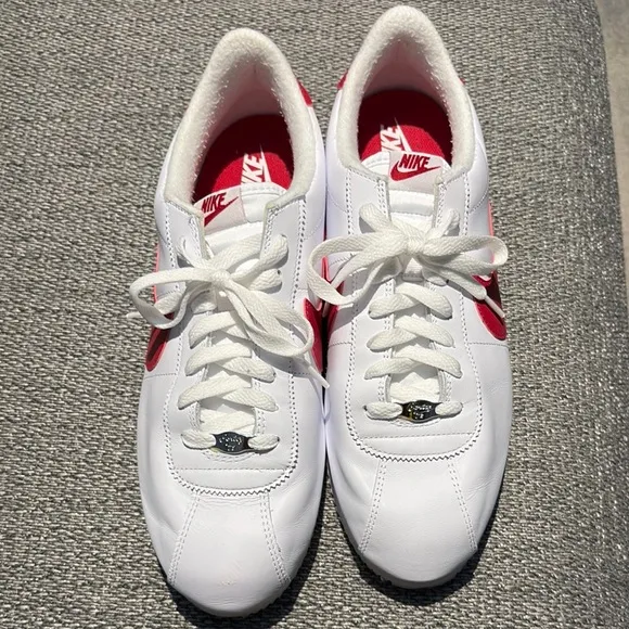 Nike Sneakers White and Red with Perforated Toe Box and Iconic Swoosh