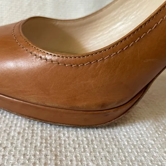 Prada tan peep toe shoes