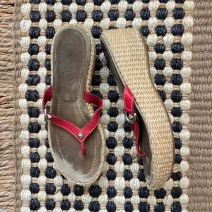 Prada woven platform red leather studded sandals
