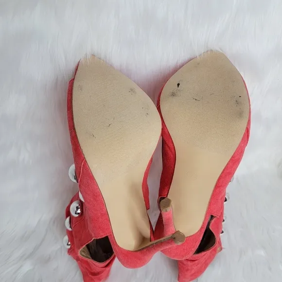 Red boots stiletto heel open toe silver studs.