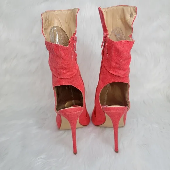 Red boots stiletto heel open toe silver studs.