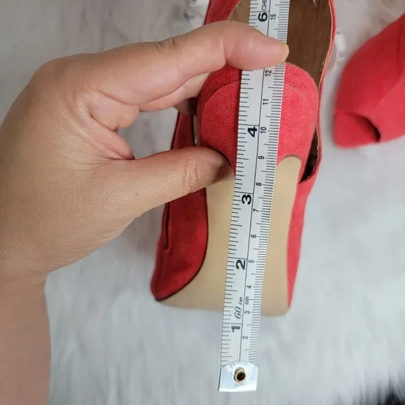 Red boots stiletto heel open toe silver studs.