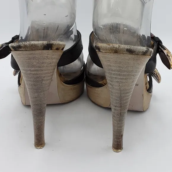 Roberto Cavalli Leopard Print Stiletto Heels with Black Leather Straps.