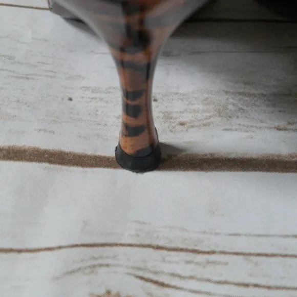 Stuart Weitzman leopard print heels with gold buckles