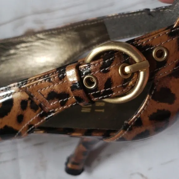 Stuart Weitzman leopard print heels with gold buckles