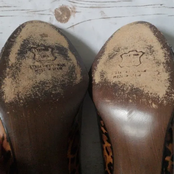 Stuart Weitzman leopard print heels with gold buckles