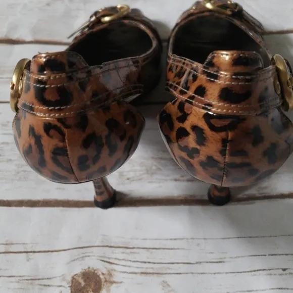 Stuart Weitzman leopard print heels with gold buckles