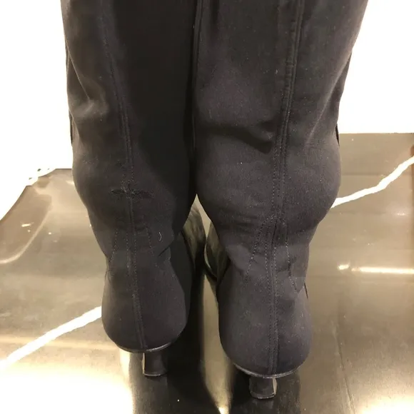 Stuart Weitzman over the knee Boots, it’s a 2 inch heel.