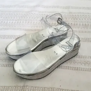 Stuart Weitzman silver glitter platform clear ankle strap occasion shoes, 6.5